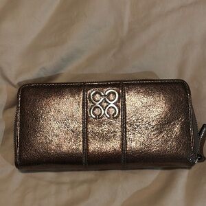 Coach Metallic leather wallet. Zipper closure.